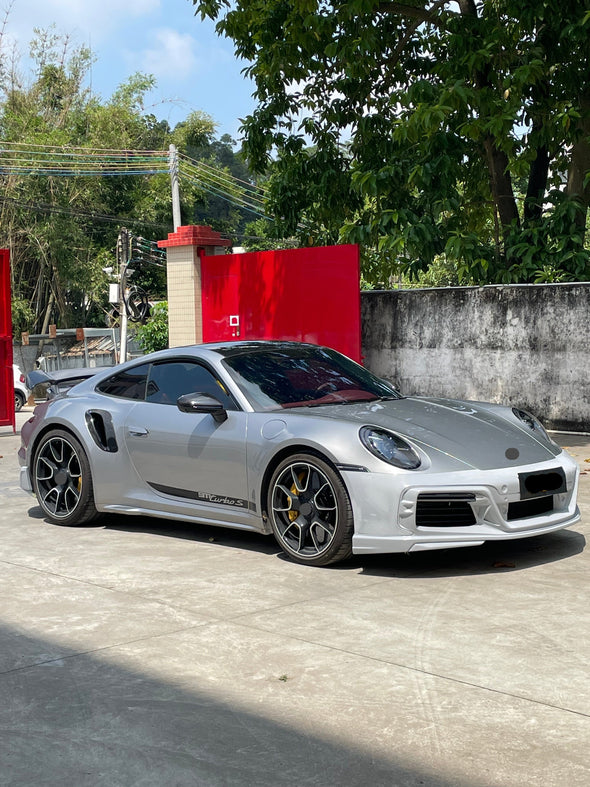 FULL CARBON BODY KIT for PORSCHE 911 (992) 2018+  Set includes:  Front Apron Front Lip / Spoiler Front Hood / Bonnet Side Fenders with Air Outlet Mirrors Side Skirts Side Air intakes Rear Apron Rear Diffuser Engine Hood / Bonnet Roof Spoiler Rear Spoiler / Wing