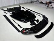 CARBON BODY KIT for BENTLEY BENTAYGA 2020+

Set includes:

Front Lip

Hood
Side Mirror Covers
Side Trims
Roof Spoiler
Rear Diffuser
Material: Carbon Fiber


Note: Professional installation is required.