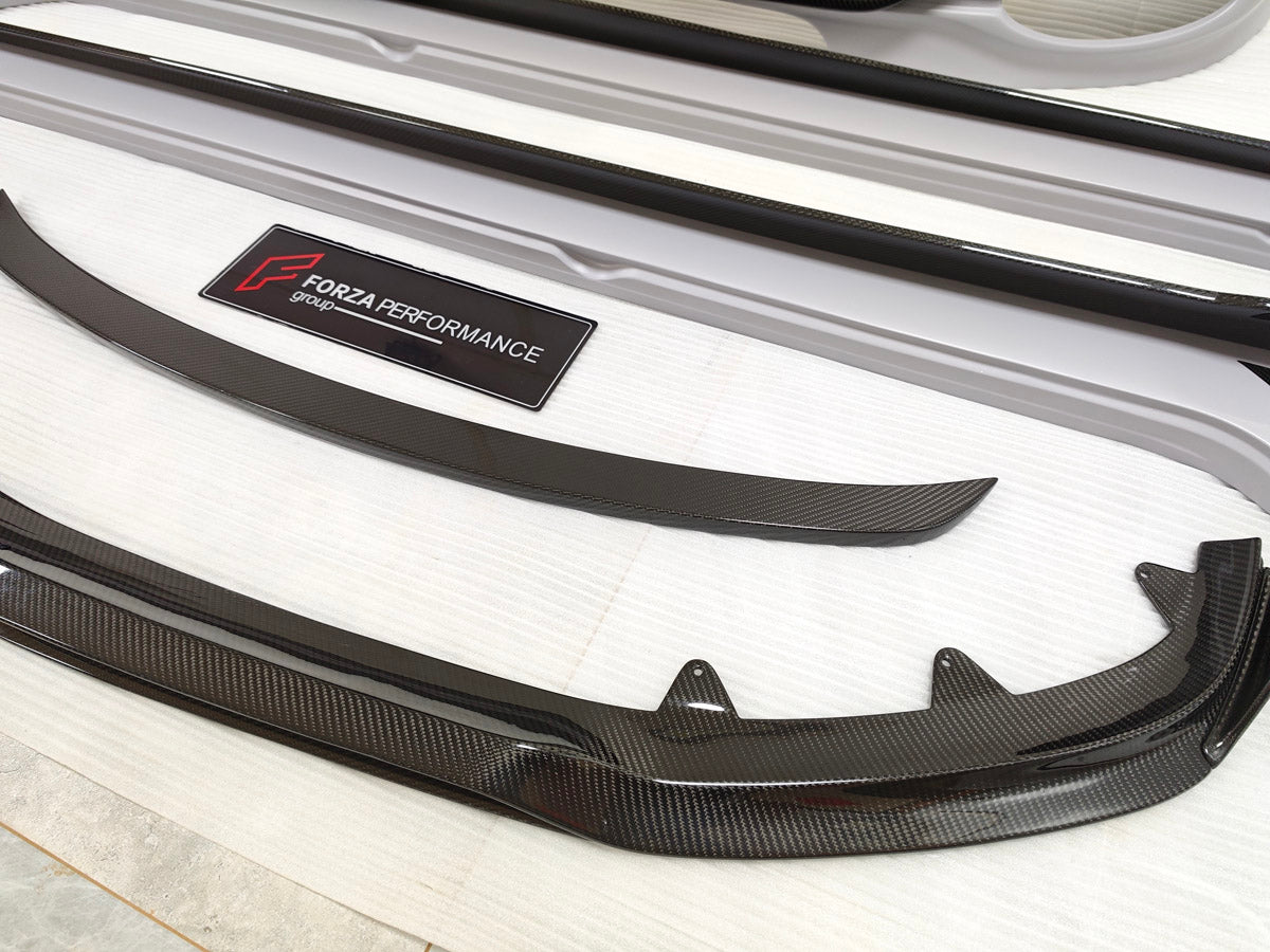 CARBON BODY KIT for BENTLEY FLYING SPUR 2020+

Set includes:
Hood Bonnet
Front Grille Frame
Front Lip
Side Skirts
Rear Diffuser
Side Mirror Covers
Material: Carbon Fiber

Note: Professional installation is required