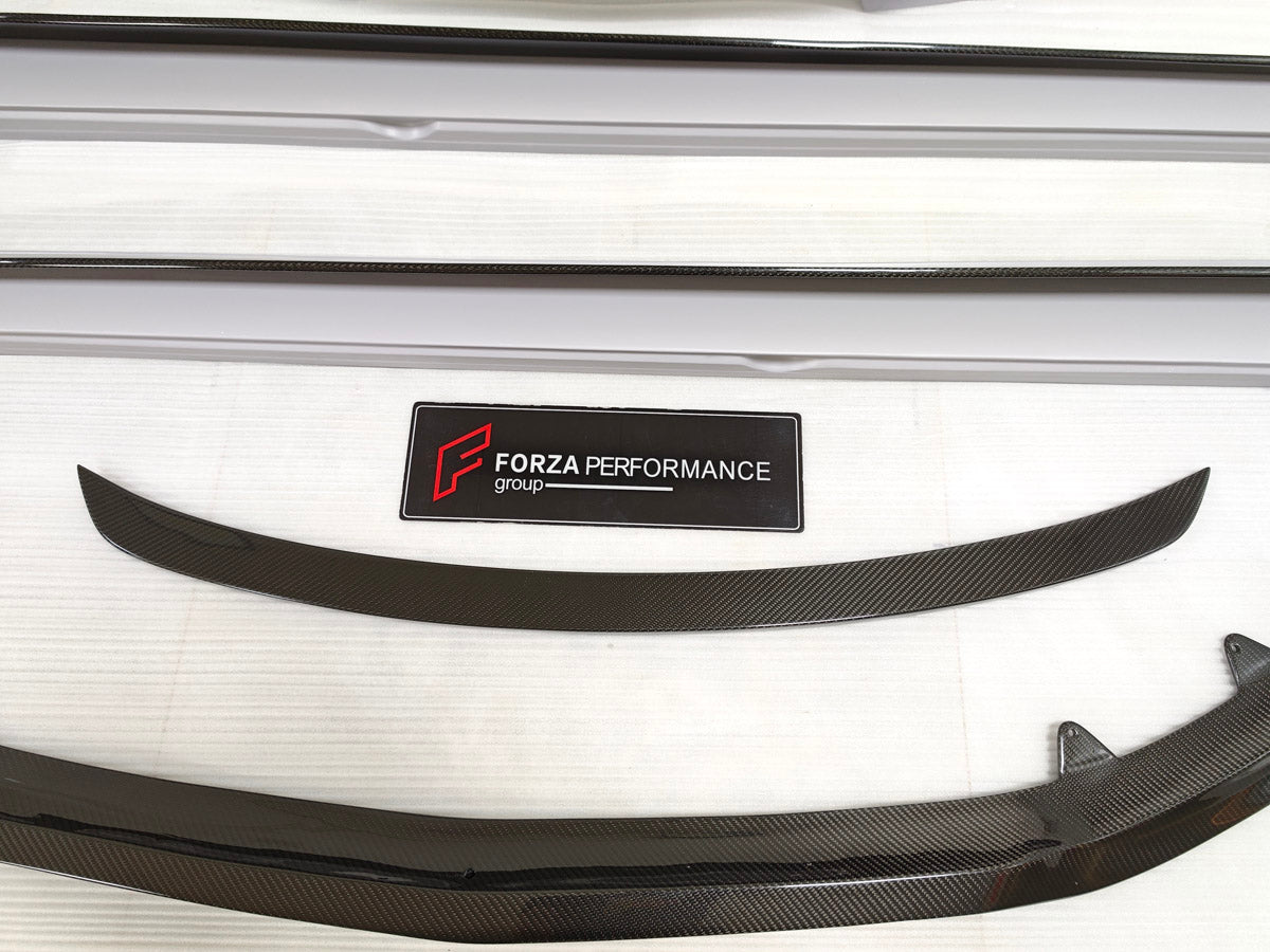 CARBON BODY KIT for BENTLEY FLYING SPUR 2020+

Set includes:
Hood Bonnet
Front Grille Frame
Front Lip
Side Skirts
Rear Diffuser
Side Mirror Covers
Material: Carbon Fiber

Note: Professional installation is required