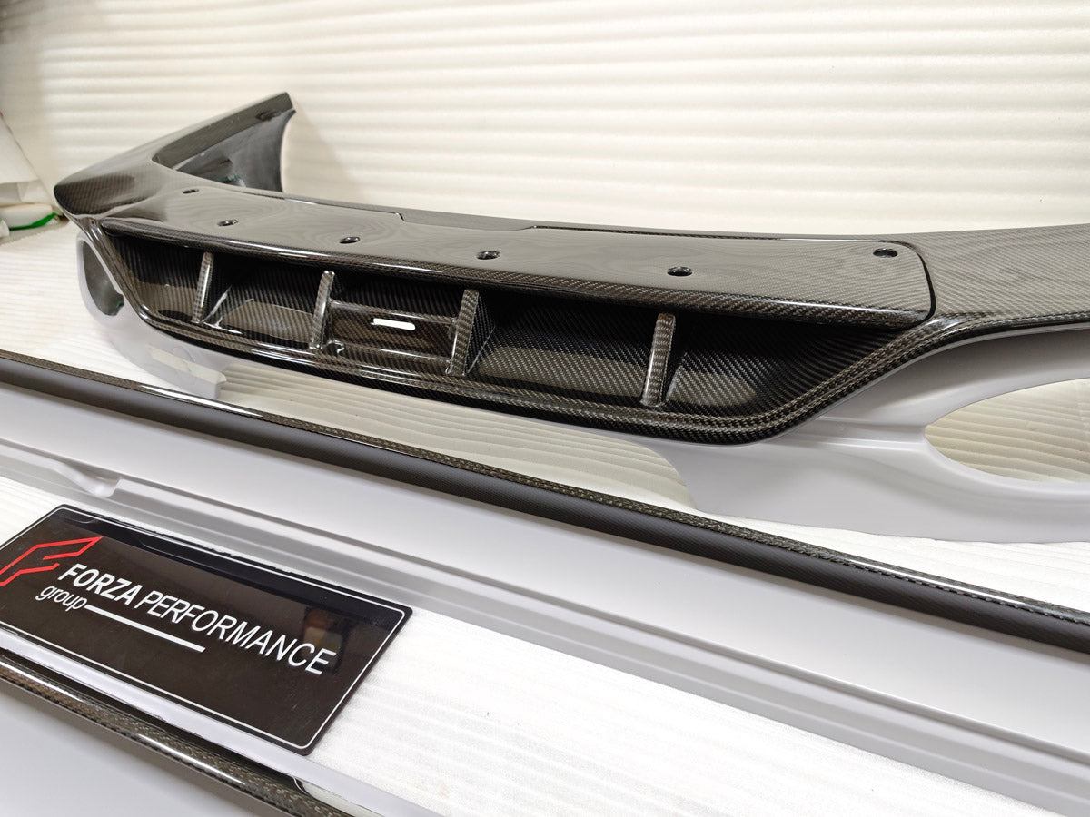 CARBON BODY KIT for BENTLEY FLYING SPUR 2020+

Set includes:
Hood Bonnet
Front Grille Frame
Front Lip
Side Skirts
Rear Diffuser
Side Mirror Covers
Material: Carbon Fiber

Note: Professional installation is required
