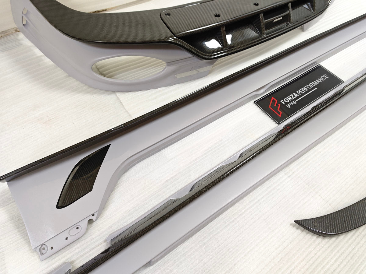 CARBON BODY KIT for BENTLEY FLYING SPUR 2020+

Set includes:
Hood Bonnet
Front Grille Frame
Front Lip
Side Skirts
Rear Diffuser
Side Mirror Covers
Material: Carbon Fiber

Note: Professional installation is required
