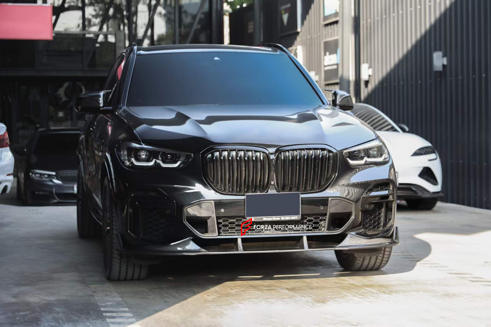 CARBON BODY KIT for BMW X5 G05 G18 2018 - 2023  Set includes:  Front Lip Front Air Vent Covers Side Mirror Covers Side Fender Air Vent Covers Roof Spoiler Rear Diffuser