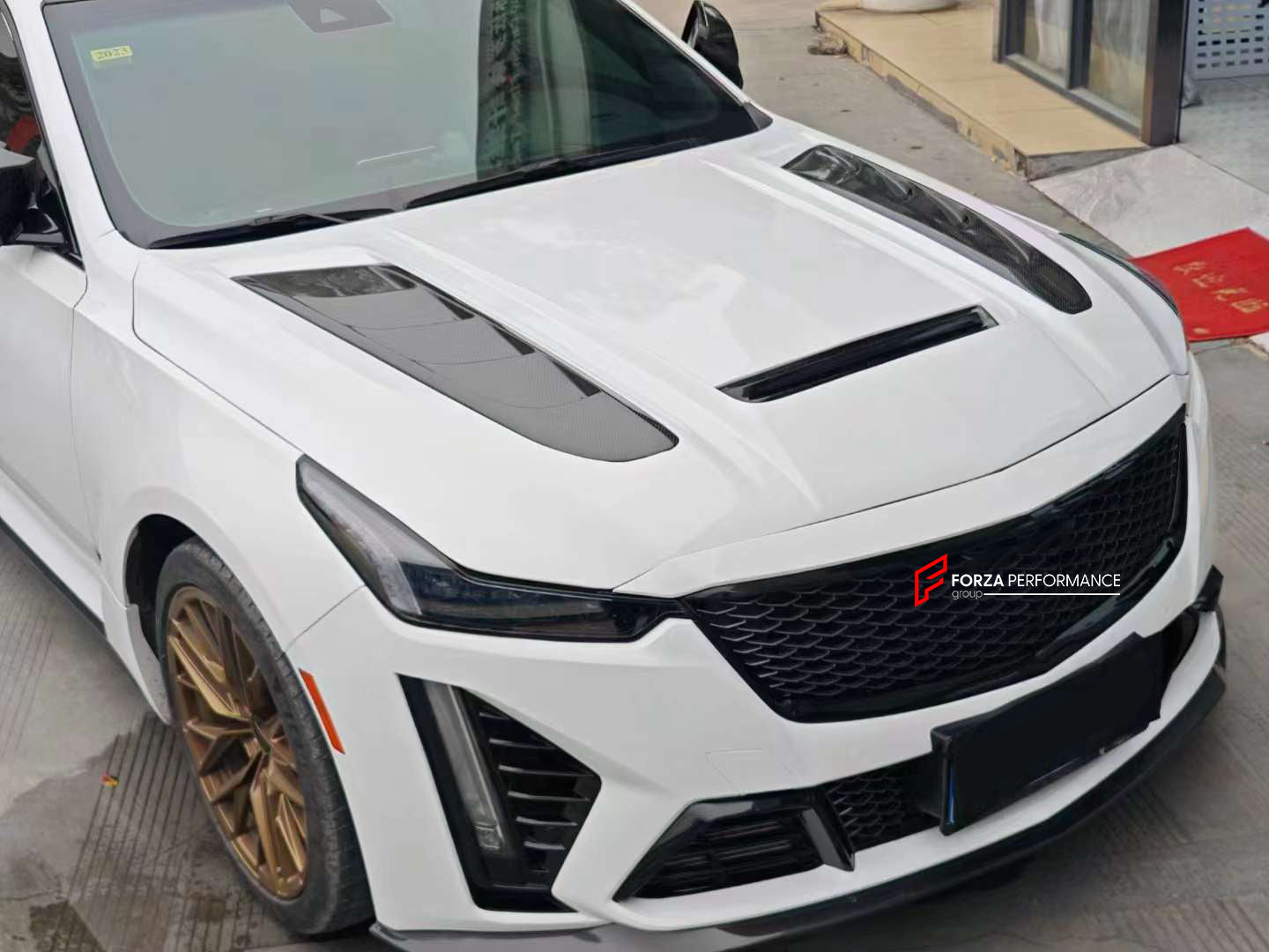 CARBON HOOD for CADILLAC CT5 2019+

Set includes:

Hood
Material: Carbon Fiber

Note: Professional installation is required.

Contact us for pricing