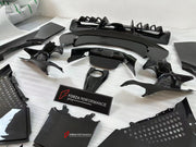 CARBON OEM GENUINE PARTS for FERRARI SF90 2021+  Set includes:  Front Lip Front Trims Side Skirts Side Vents Rear Diffuser Rear Spoiler Wing Material: Carbon Fiber  NOTE: Professional installation is required.  Contact us for pricing