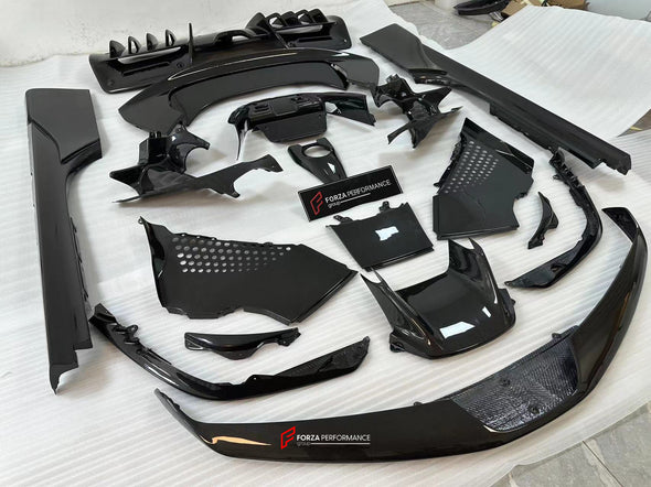 CARBON OEM GENUINE PARTS for FERRARI SF90 2021+  Set includes:  Front Lip Front Trims Side Skirts Side Vents Rear Diffuser Rear Spoiler Wing Material: Carbon Fiber  NOTE: Professional installation is required.  Contact us for pricing