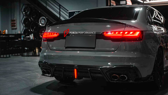 CARBON BODY KIT FOR AUDI S4 AVANT RS4 B9 2019+

Set includes:

Front Lip
Front Canards
Hood/Bonnet
Side Skirts
Rear Roof Spoiler
Rear Diffuser (two options)

Material: Carbon

NOTE: Professional installation is required