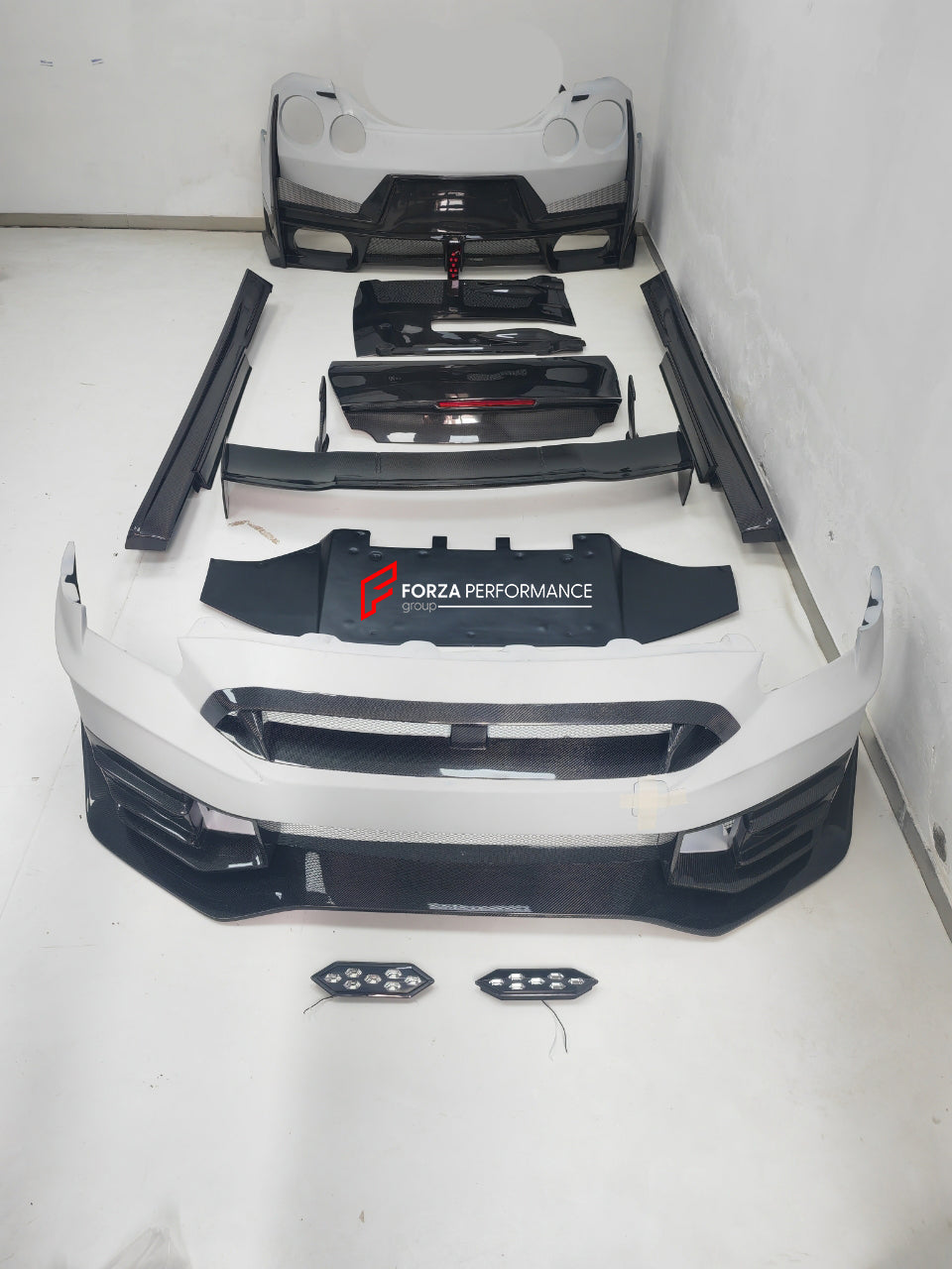 CONVERSION BODY KIT for NISSAN GT-R R35 2007 - 2016 | 2016 - 2023 to NISSAN GT-R R35 2024+  Set includes:  Front Bumper Headlights Front Fog Lights Side Skirts Rear Bumper Rear Trunk Rear Spoiler Tail Lights