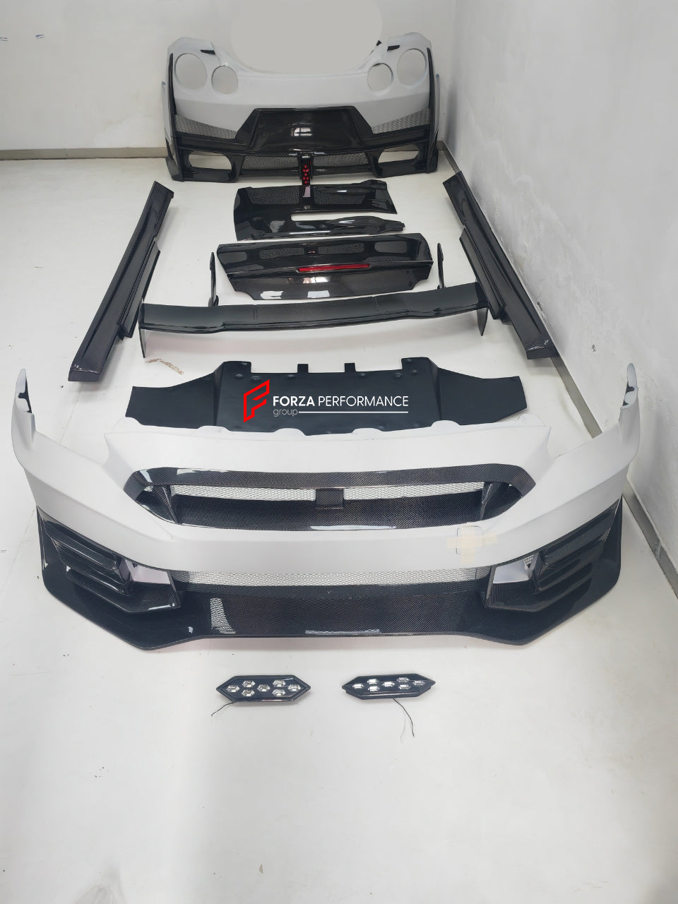 CONVERSION BODY KIT for NISSAN GT-R R35 2007 - 2016 | 2016 - 2023 to NISSAN GT-R R35 2024+  Set includes:  Front Bumper Headlights Front Fog Lights Side Skirts Rear Bumper Rear Trunk Rear Spoiler Tail Lights