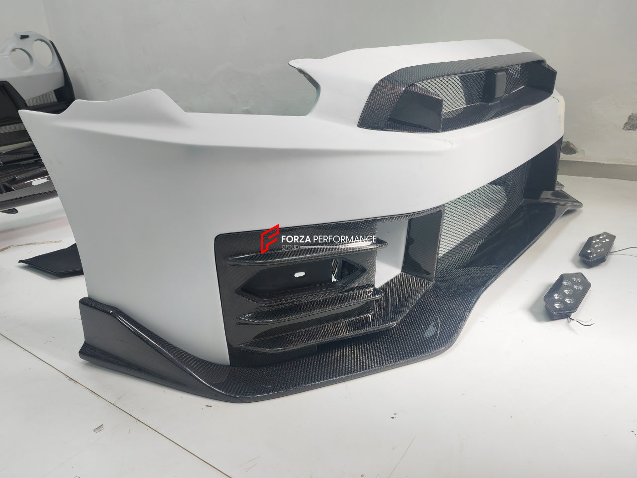 CONVERSION BODY KIT for NISSAN GT-R R35 2007 - 2016 | 2016 - 2023 to NISSAN GT-R R35 2024+  Set includes:  Front Bumper Headlights Front Fog Lights Side Skirts Rear Bumper Rear Trunk Rear Spoiler Tail Lights