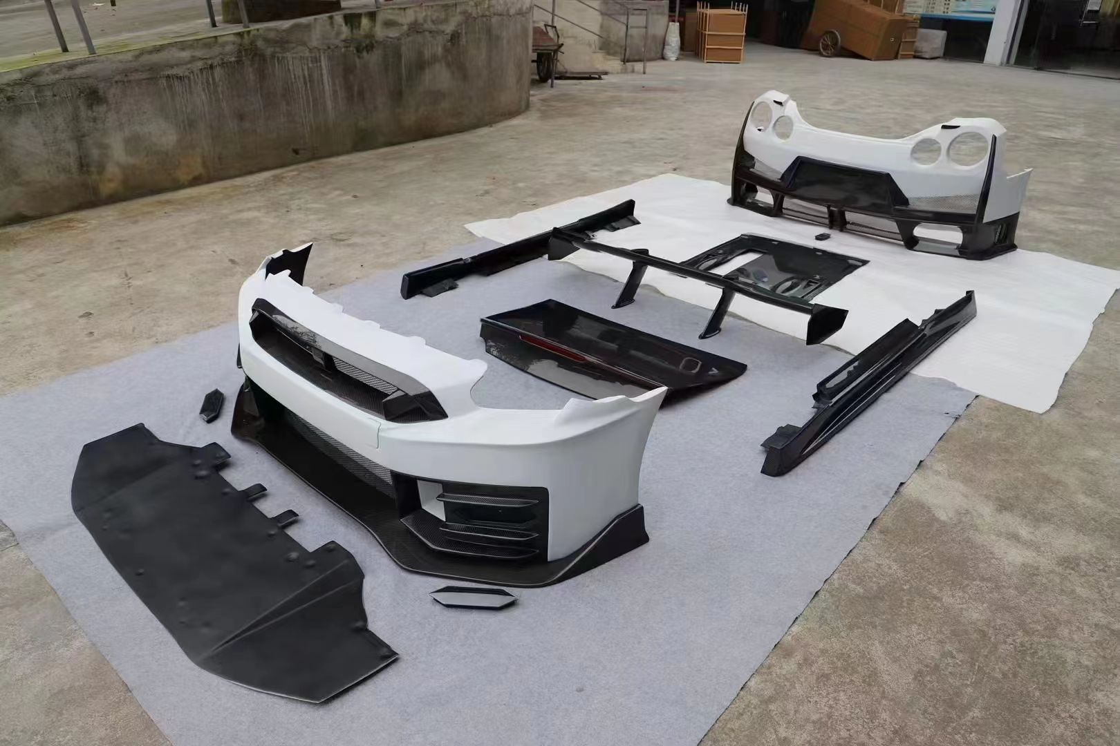 CONVERSION BODY KIT for NISSAN GT-R R35 2007 - 2016 | 2016 - 2023 to NISSAN GT-R R35 2024+  Set includes:  Front Bumper Front Fog Lights Side Skirts Rear Bumper Rear Trunk Rear Spoiler