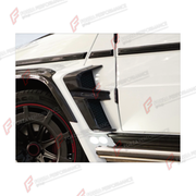 CONVERSION DRY CARBON FENDER TRIM COVERS for MERCEDES-BENZ G-CLASS W463 2008 - 2018 UPGRADE to G-CLASS W464 2019 - 2024

Set includes:
Front Fender Trim Covers
Rear Fender Trim Covers

Material: Dry Carbon

NOTE: Professional installation is required.
