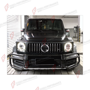 CONVERSION FRONT BUMPER BULL BAR for MERCEDES-BENZ G-CLASS W463 2008 - 2018 UPGRADE to G-CLASS W464 2019 - 2024

Set includes:
Front Bumper Bull Bar

Material: Plastic

NOTE: Professional installation is required.