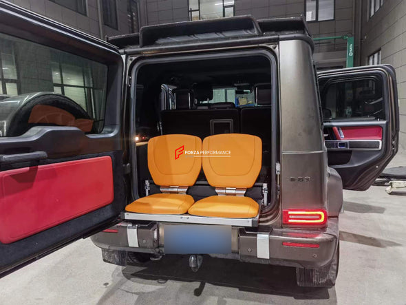 CULLINAN VIEWING SUITE STYLE AUTO RETRACTABLE FOLDING TRUNK SEATS for ALL SUV MODELS  Will fit to:  Mercedes-Benz G-Class G63 W463, W463A, W464, G400, G500, G550, 4X4, V-Class, Vito Land Rover Defender L663, Range Rover L460, Sport L461, Velar L560, L405 Toyota Land Cruiser Prado, 250 Prado, Highlander, RAV4, LC300 Lexus GX550, LX570, LX600, RX350 Jeep Grand Cherokee, Wrangler Rolls-Royce Cullinan Lamborghini Urus Tesla Model X AND SIMILAR CARS