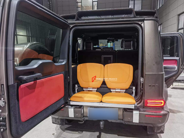 CULLINAN VIEWING SUITE STYLE AUTO RETRACTABLE FOLDING TRUNK SEATS for ALL SUV MODELS  Will fit to:  Mercedes-Benz G-Class G63 W463, W463A, W464, G400, G500, G550, 4X4, V-Class, Vito Land Rover Defender L663, Range Rover L460, Sport L461, Velar L560, L405 Toyota Land Cruiser Prado, 250 Prado, Highlander, RAV4, LC300 Lexus GX550, LX570, LX600, RX350 Jeep Grand Cherokee, Wrangler Rolls-Royce Cullinan Lamborghini Urus Tesla Model X AND SIMILAR CARS