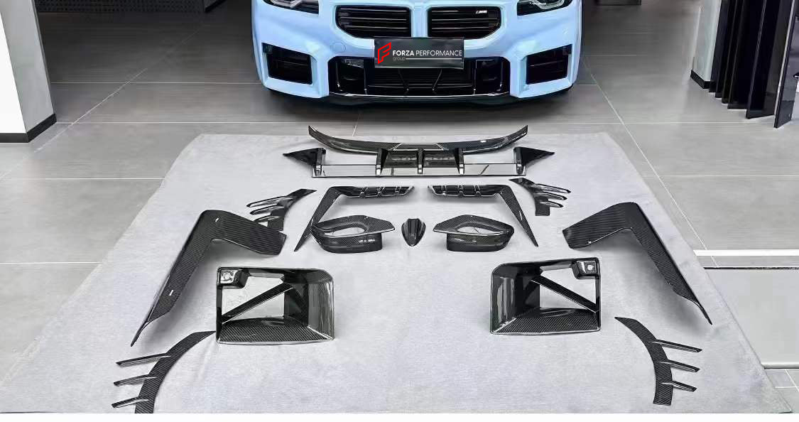 CARBON BODY KIT FOR BMW M2/M2C G87  Set includes:  Front Lip Front Vent Covers Front Canards Rear Diffuser Rear Spoiler Rear Canards Skit plate Side Skirts  Side Canards Mirror Covers