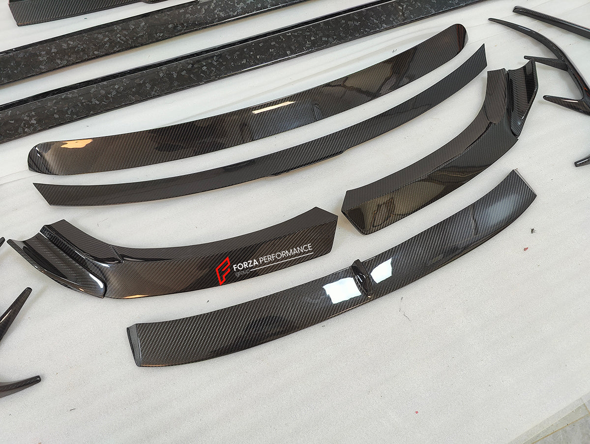 DRY CARBON BODY KIT for ROLLS-ROYCE GHOST 2020+

Set includes:

Front Lip
Front Bumper Covers
Side Skirts
Roof Spoiler
Rear Spoiler
Rear Bumper Covers
Rear Diffuser

Material: Dry Carbon

NOTE: Professional installation is required