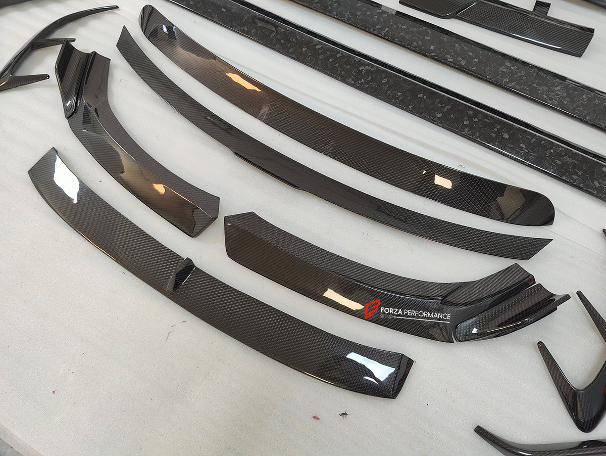DRY CARBON BODY KIT for ROLLS-ROYCE GHOST 2020+

Set includes:

Front Lip
Front Bumper Covers
Side Skirts
Roof Spoiler
Rear Spoiler
Rear Bumper Covers
Rear Diffuser

Material: Dry Carbon

NOTE: Professional installation is required
