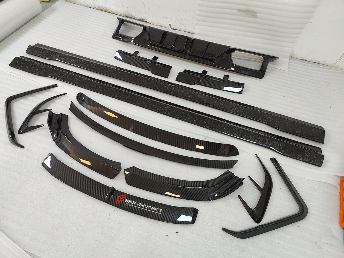 DRY CARBON BODY KIT for ROLLS-ROYCE GHOST 2020+

Set includes:

Front Lip
Front Bumper Covers
Side Skirts
Roof Spoiler
Rear Spoiler
Rear Bumper Covers
Rear Diffuser

Material: Dry Carbon

NOTE: Professional installation is required