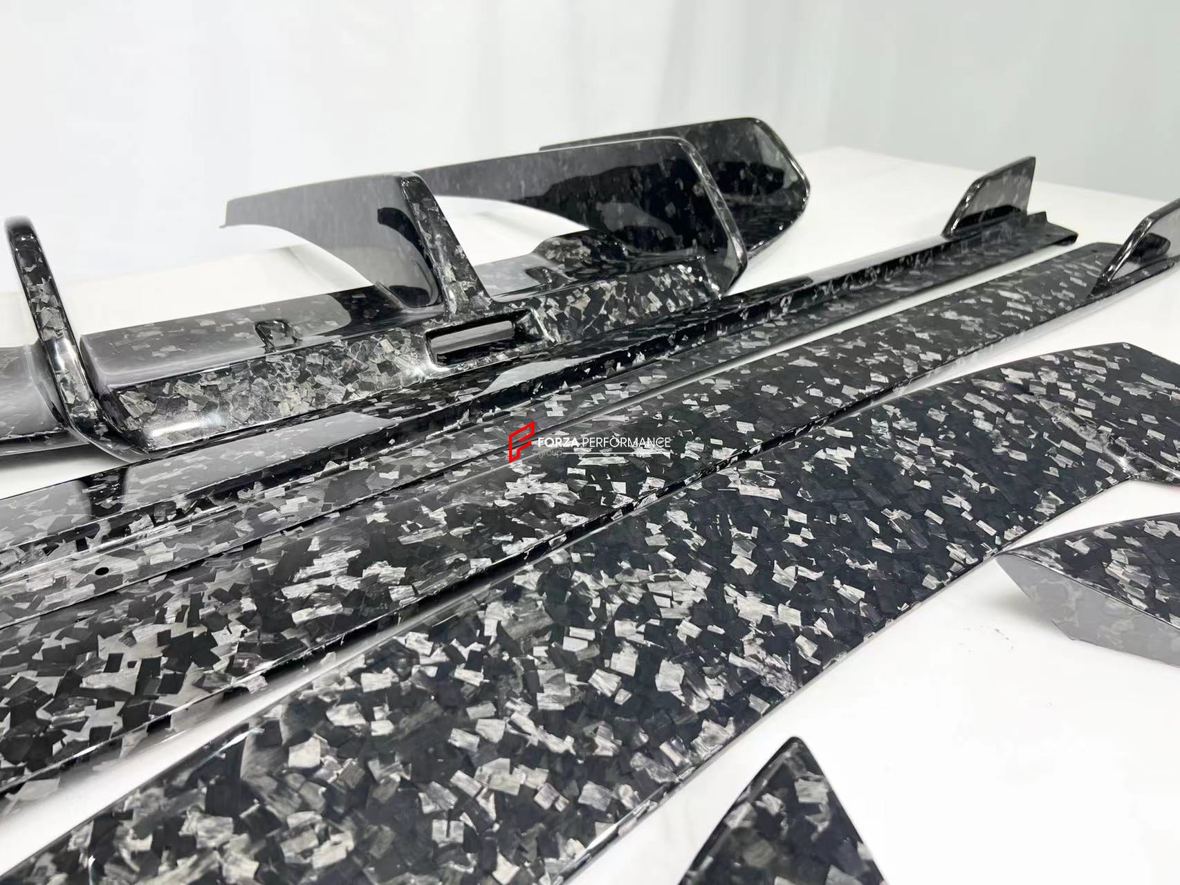 DRY CARBON BODY KIT for LOTUS EMIRA  Set includes:  Front Lip Side Skirts Rear Diffuser Rear Spoiler Front Air Vents Side Air Vents Rear Air Duct Side Mirrors