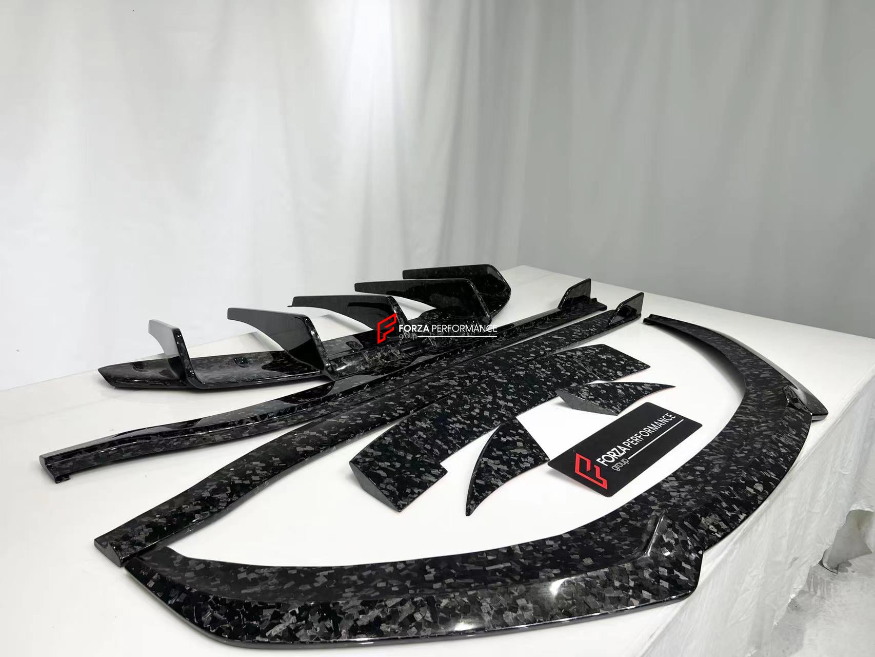 DRY CARBON BODY KIT for LOTUS EMIRA  Set includes:  Front Lip Side Skirts Rear Diffuser Rear Spoiler Front Air Vents Side Air Vents Rear Air Duct Side Mirrors