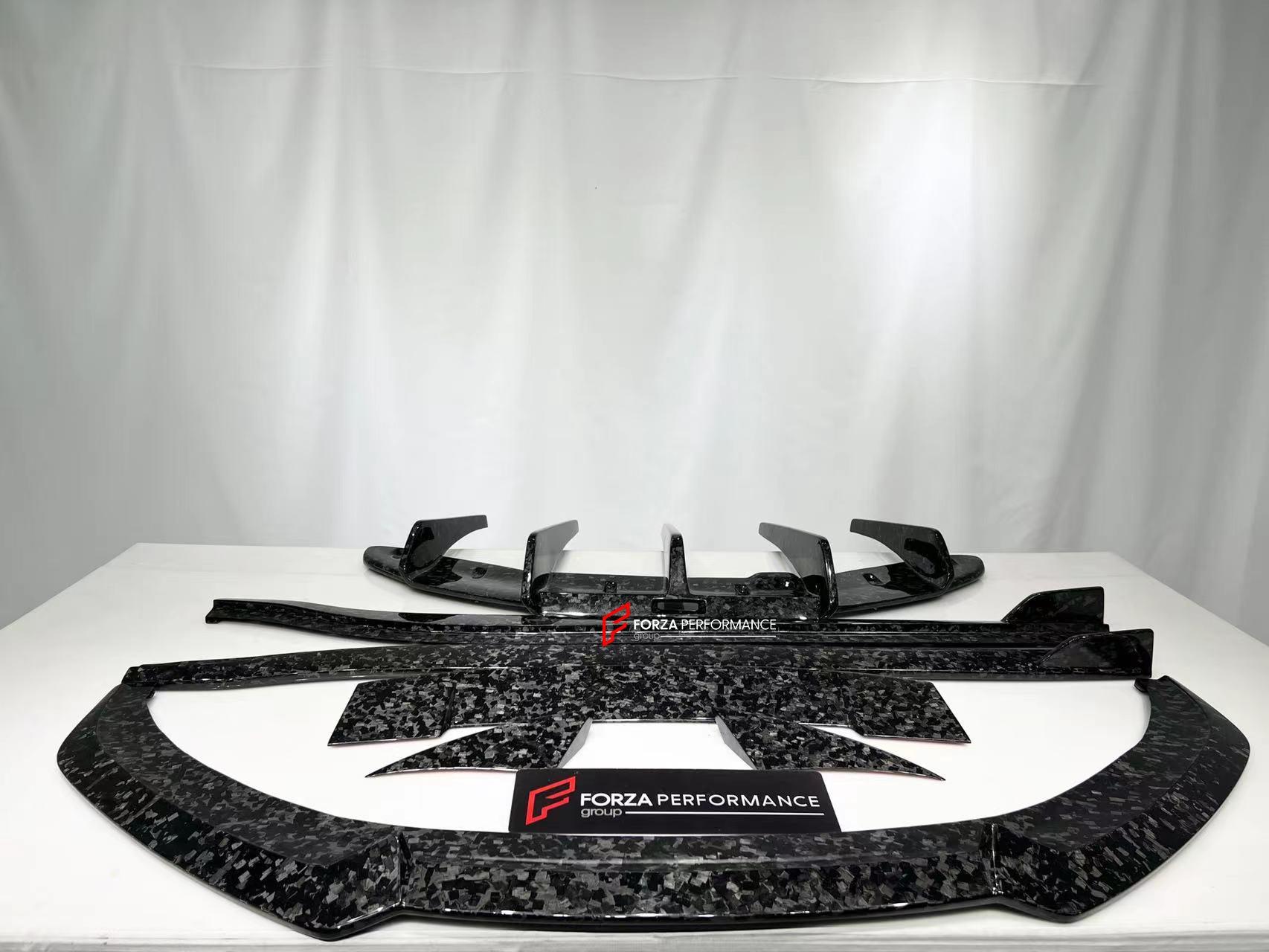 DRY CARBON BODY KIT for LOTUS EMIRA  Set includes:  Front Lip Side Skirts Rear Diffuser Rear Spoiler Front Air Vents Side Air Vents Rear Air Duct Side Mirrors