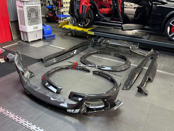 DRY CARBON OEM PARTS for FERRARI PUROSANGUE  Set includes:  Front Lip Side Fenders Side Skirts Rear Diffuser