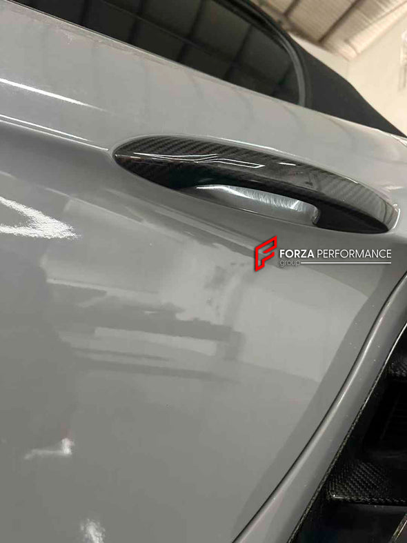 Dry Carbon Parts For Porsche 718 (982) 2016 +&nbsp;

Set includes:

Door Handle Covers

Material: Dry Carbon&nbsp;

NOTE: Professional installation is required.&nbsp;