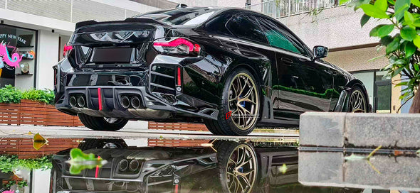DRY CARBON FIBER BODY KIT for BMW M2/M2C G87

Set includes:

Front Lip
Front Grille
Front lower Mesh
Front fenders
Side skirts
Rear Diffuser
Rear Bumper canards
Rear Spoiler
Rear trunk (OEM size)

Material: Dry Carbon Fiber

NOTE: Professional installation is requiredDRY CARBON FIBER BODY KIT for BMW M2/M2C G87

Set includes:

Front Lip
Front Grille
Front lower Mesh
Front fenders
Side skirts
Rear Diffuser
Rear Bumper canards
Rear Spoiler
Rear trunk (OEM size)

Material: Dry Carbon Fiber

NOTE: Professional 