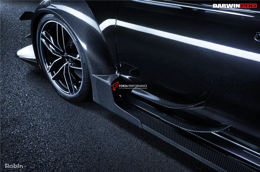 AUTHENTIC DARWINPRO DTM STYLE CARBON WIDE BODY KIT for AUDI RS6 C7 AVANT 2014 - 2018  Set includes:  Hood Front lip Front canards Fender flares Side skirts Side canards Bumper spoiler Rear bumper canards Door canards Rear fender canards Rear diffuser canards Roof spoiler Trunk spoiler Material: Carbon fiber / Forged Carbon / Fiberglass + Carbon / Autoclave carbon fiber / Double sided carbon fiber  NOTE: Professional installation is required  Contact us for pricing