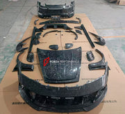 FORGED CARBON BODY KIT for PORSCHE 911 992 CARRERA TURBO S 4S custom fit MANSORY

Set includes:

Front Bumper Assembly
Hood
Fender Flares
Fender Vents
Side Mirror Covers
Side Skirts
Side Vent Covers
Rear Bumper Assembly