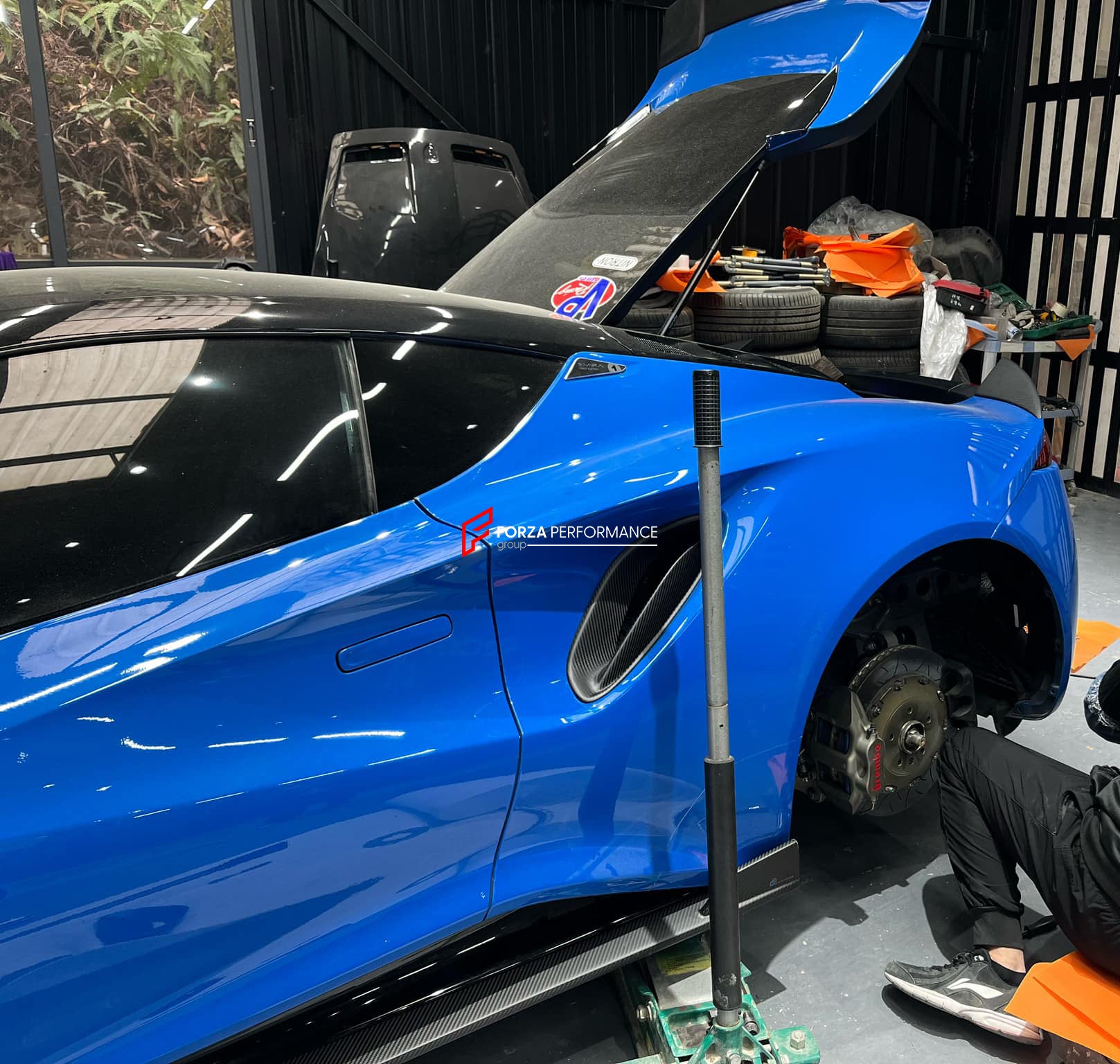 DRY CARBON BODY KIT for LOTUS EMIRA  Set includes:  Front Lip Side Skirts Rear Diffuser Rear Spoiler Front Air Vents Side Air Vents Rear Air Duct Side Mirrors