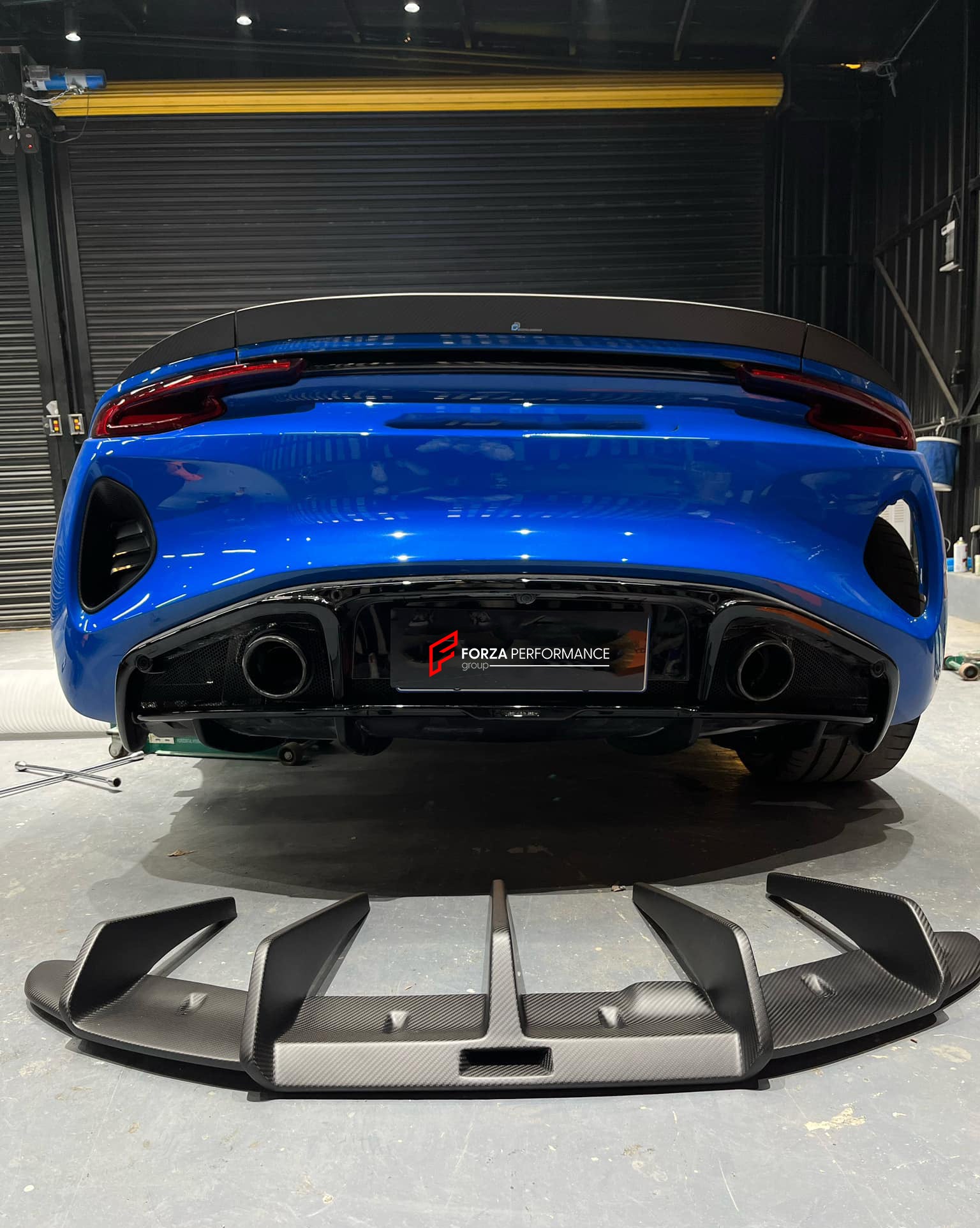 DRY CARBON BODY KIT for LOTUS EMIRA  Set includes:  Front Lip Side Skirts Rear Diffuser Rear Spoiler Front Air Vents Side Air Vents Rear Air Duct Side Mirrors