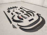 CARBON BODY KIT for PORSCHE TAYCAN  Set includes:  Front Lip Fender Flares Side Skirts Rear Diffuser