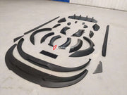 CARBON BODY KIT for PORSCHE TAYCAN  Set includes:  Front Lip Fender Flares Side Skirts Rear Diffuser