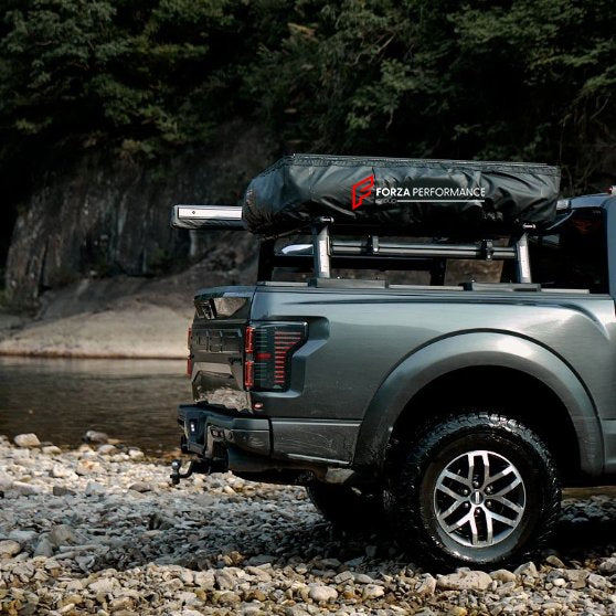 TentCamping tent and mounting for a car.
