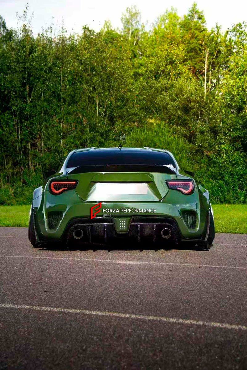 WIDE BODY KIT for TOYOTA GT86 2016 - 2022

Set includes:

Front Lip
Front bumper&nbsp;
Hood/bonnet
Fenders
Side skirt
Rear spoiler
Rear bumper&nbsp;
Rear diffuser&nbsp;

Material: Plastic

Note: Professional installation is required