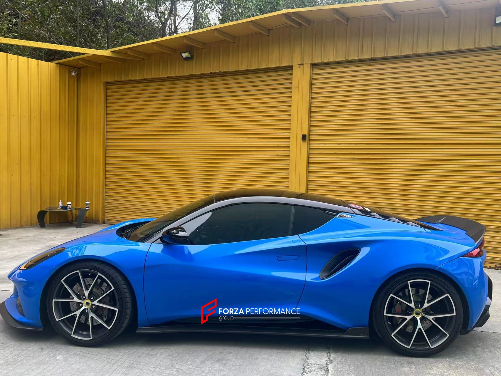 DRY CARBON BODY KIT for LOTUS EMIRA  Set includes:  Front Lip Side Skirts Rear Diffuser Rear Spoiler Front Air Vents Side Air Vents Rear Air Duct Side Mirrors