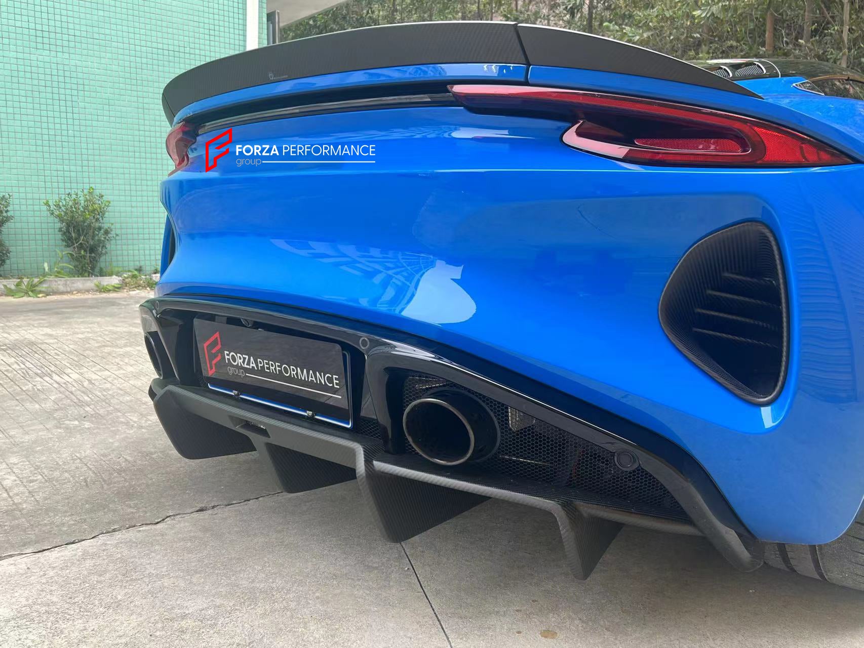 DRY CARBON BODY KIT for LOTUS EMIRA  Set includes:  Front Lip Side Skirts Rear Diffuser Rear Spoiler Front Air Vents Side Air Vents Rear Air Duct Side Mirrors