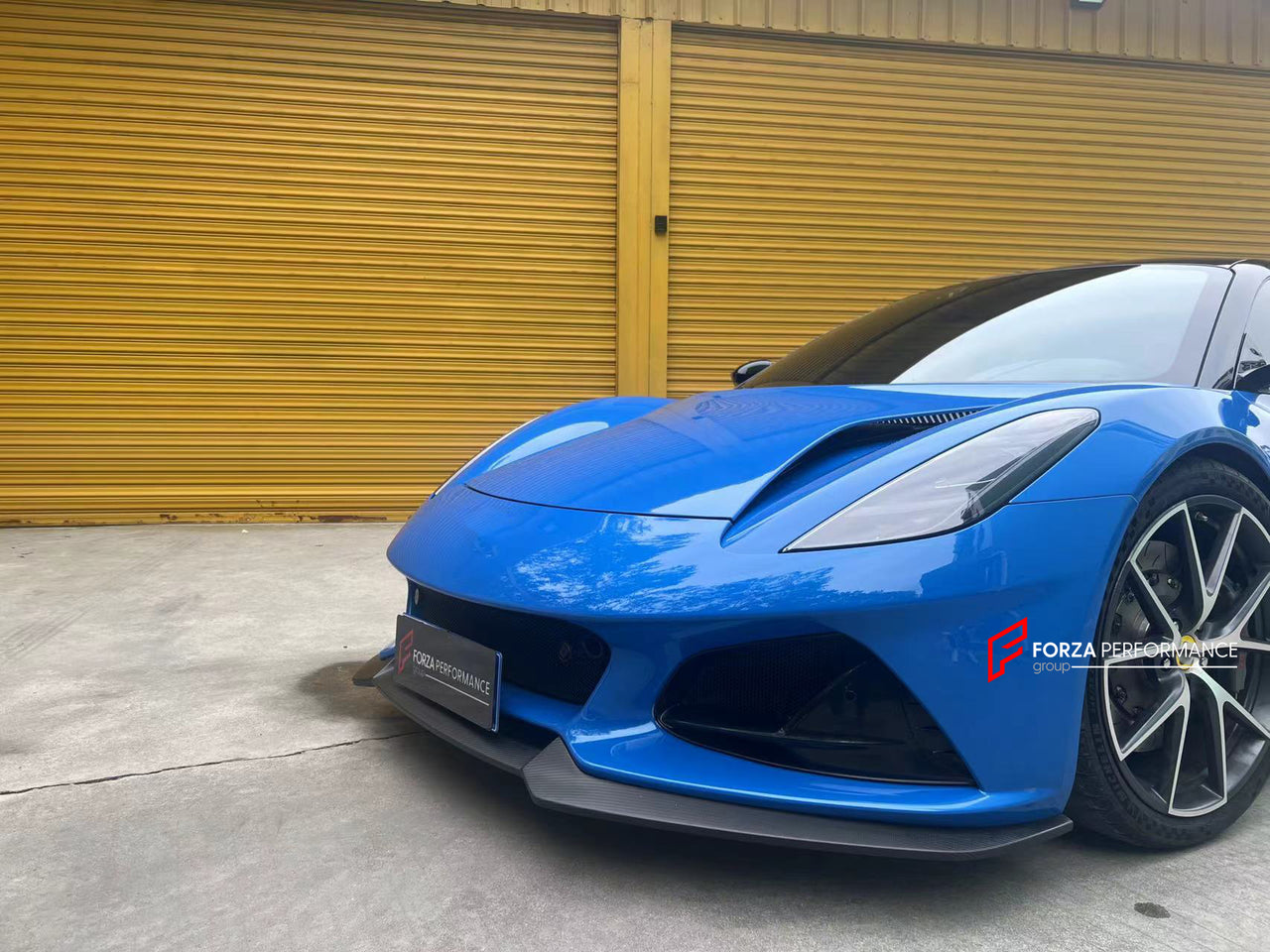 DRY CARBON BODY KIT for LOTUS EMIRA  Set includes:  Front Lip Side Skirts Rear Diffuser Rear Spoiler Front Air Vents Side Air Vents Rear Air Duct Side Mirrors