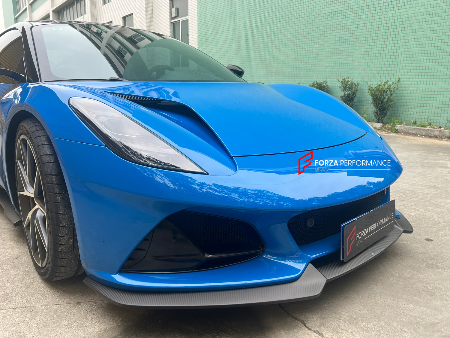 DRY CARBON BODY KIT for LOTUS EMIRA  Set includes:  Front Lip Side Skirts Rear Diffuser Rear Spoiler Front Air Vents Side Air Vents Rear Air Duct Side Mirrors