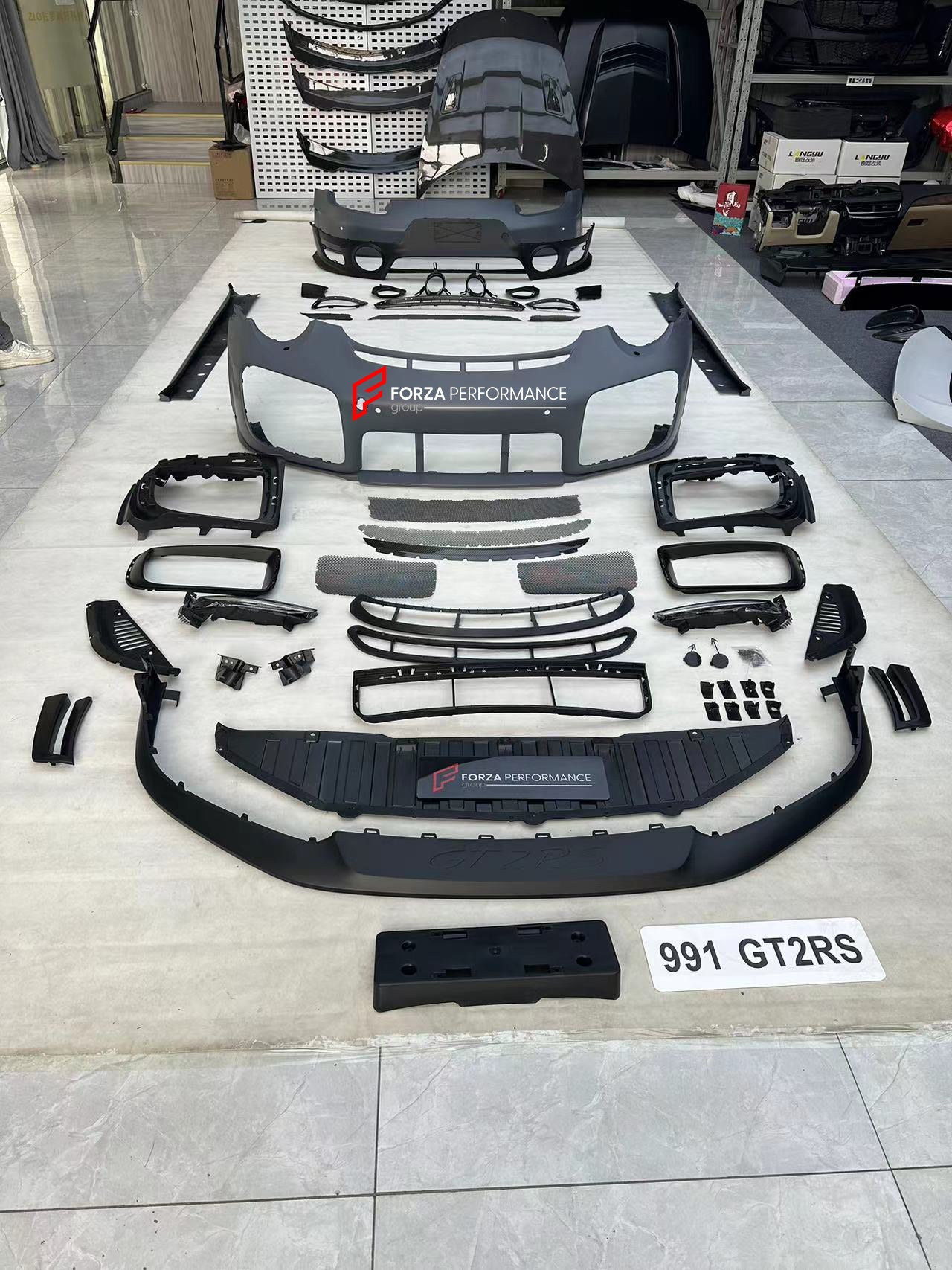 CONVERSION BODY KIT for PORSCHE 911 991.1 991.2 2012 - 2018 UPGRADE to GT2RS  Set includes:  Front Bumper Side Skirts Fender Flares Rear Bumper Front Lip Carbon Hood Carbon Trunk Exhaust Tips