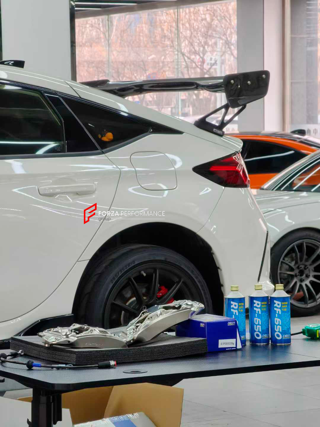 ADTORY X FORZA PERFORMANCE RACE BIG BRAKE KIT BBK for HONDA CIVIC TYPE R FL5 2022+

ADTORY Brake Kits are engineered as bolt on upgrades that work with the factory master cylinder and ABS, delivering stronger, more repeatable stops with the pedal feel you want. Whether you cruise the city, carve canyons, or chase lap times.

Highlights

Track-ready, heat-resistant components.
Jewel-like caliper finish is incredibly durable and easy to clean
Pistons are calibrated to integrate smoothly with the Factory OEM m