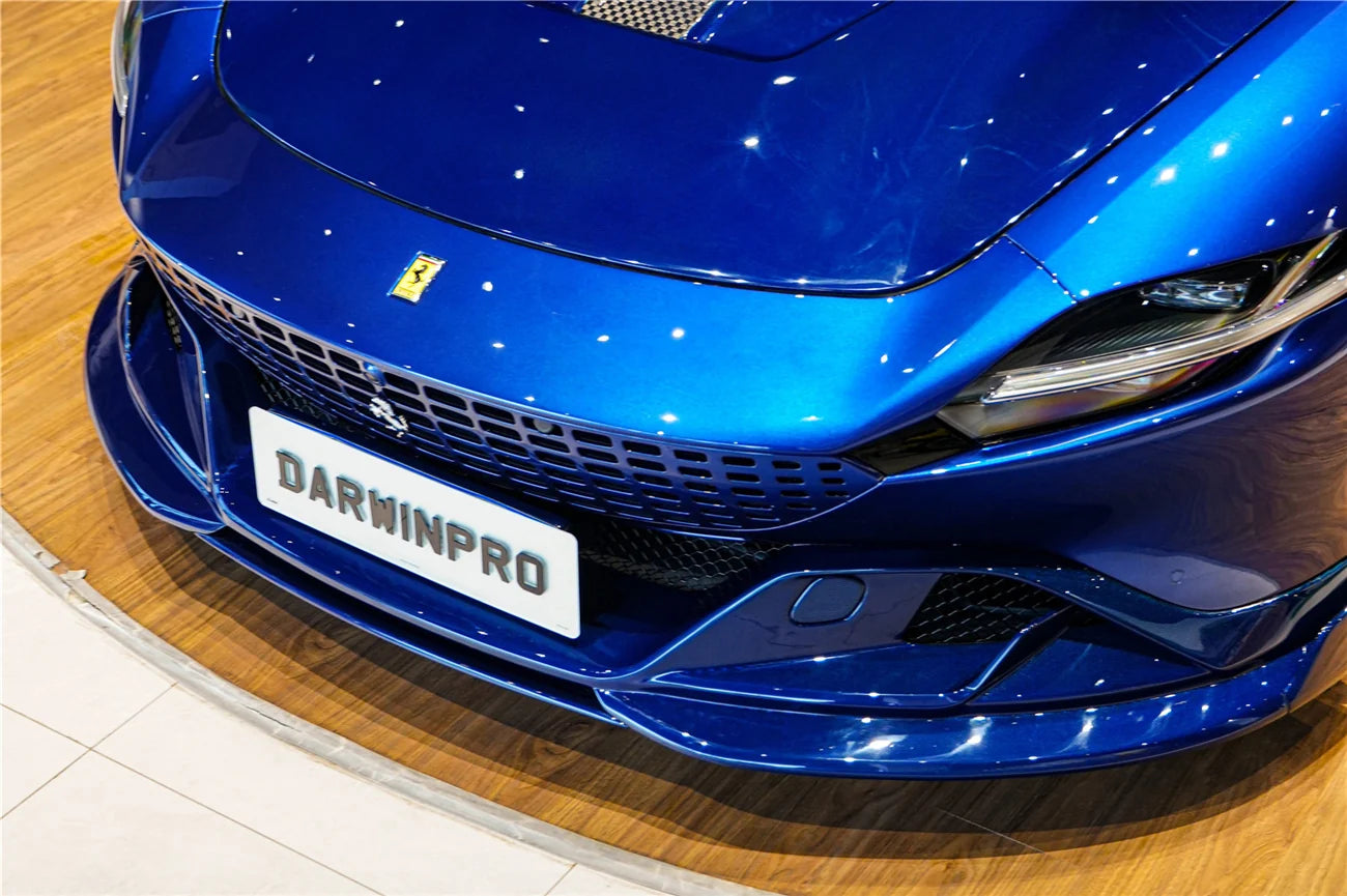 AUTHENTIC DARWINPRO CARBON FRONT LIP SPLITTER for FERRARI ROMA 2020+ Forza Performance Custom fit BKSS Style
Set includes:

Front Lip Splitter
Material: Carbon (Can be made in Forged Carbon or Dry Carbon)

NOTE: Professional installation is required.