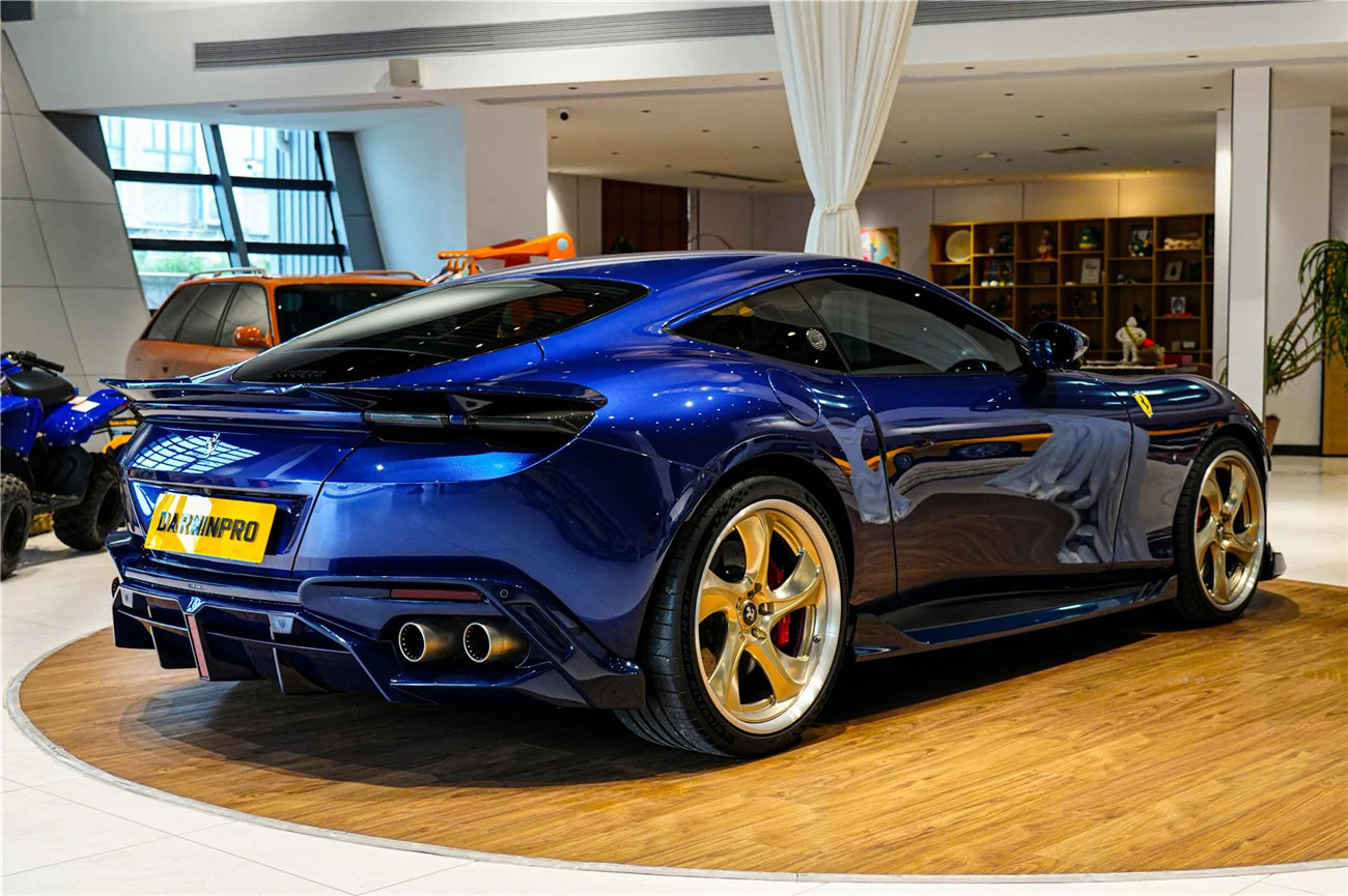 AUTHENTIC DARWINPRO CARBON REAR DIFFUSER for FERRARI ROMA 2020+ Forza Performance Custom fit BKSS Style
Set includes:

Rear Diffuser
Material: Carbon (Can be made in Forged Carbon or Dry Carbon)

NOTE: Professional installation is required.
