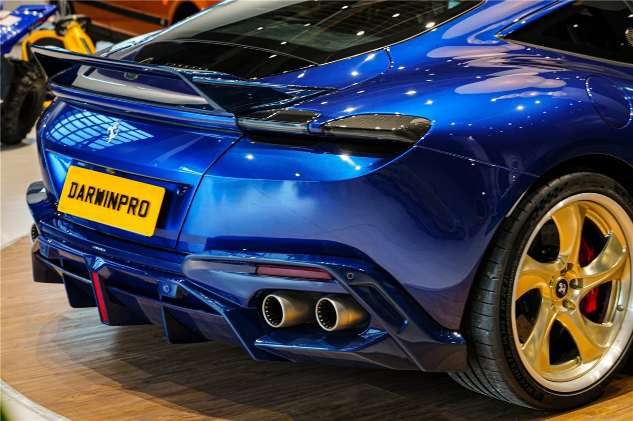 AUTHENTIC DARWINPRO CARBON REAR DIFFUSER for FERRARI ROMA 2020+ Forza Performance Custom fit BKSS Style
Set includes:

Rear Diffuser
Material: Carbon (Can be made in Forged Carbon or Dry Carbon)

NOTE: Professional installation is required.