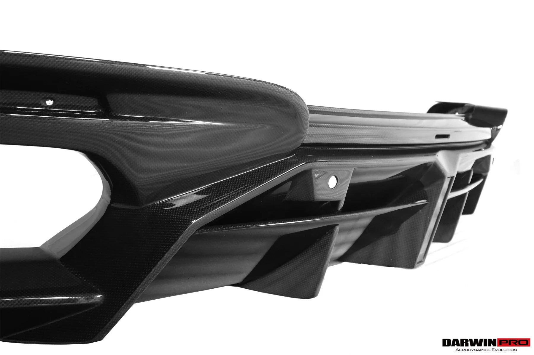 AUTHENTIC DARWINPRO CARBON REAR DIFFUSER for FERRARI ROMA 2020+ Forza Performance Custom fit BKSS Style
Set includes:

Rear Diffuser
Material: Carbon (Can be made in Forged Carbon or Dry Carbon)

NOTE: Professional installation is required.