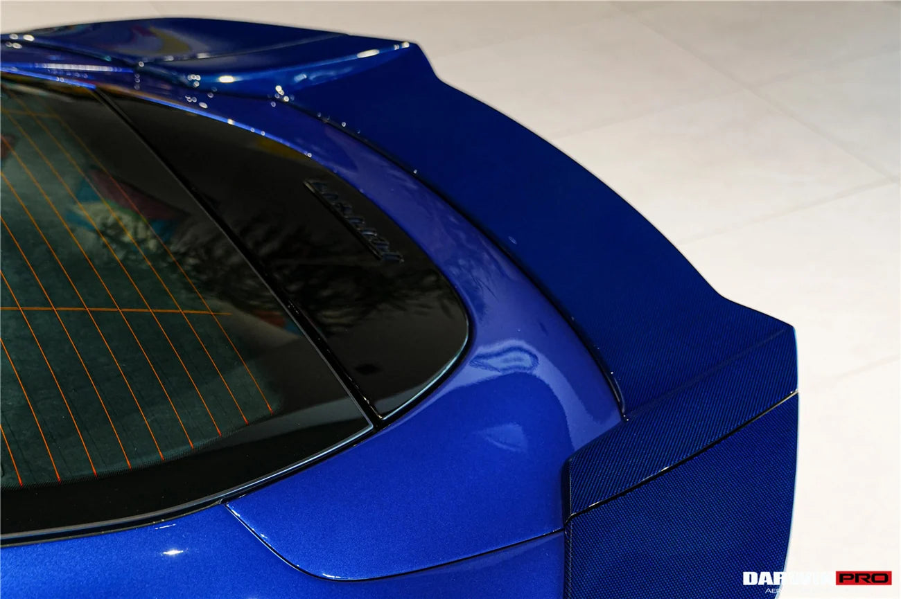 AUTHENTIC DARWINPRO CARBON REAR SPOILER for FERRARI ROMA 2020+ Forza Performance Custom fit BKSS Style
Set includes:

Rear Spoiler
Material: Carbon (Can be made in Forged Carbon or Dry Carbon)

NOTE: Professional installation is required.