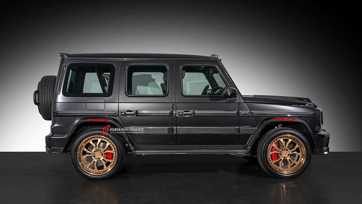 AUTHENTIC ROWEN CARBON BODY KIT for MERCEDES BENZ G CLASS AMG G63 W465 2024+

Set includes:

Front Lip

Front Bumper Air Vents Cover
Front Bumper Trims
Headlights Cover
Grille Cover
Turning Lights Cover
Hood Scoop
Roof Light
Roof Strip Trims
Door Window Frame
Side Mirrors Cover
Side Molding Trims
Door Panels
Fender Flares
Rear Spoiler
Rear Bumper Trims&nbsp;
Taillights Trims
Rear Diffuser

Material: Carbon Fiber