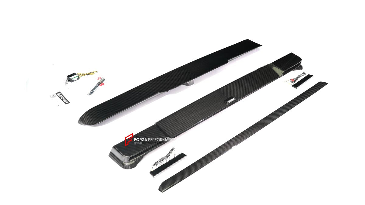 AUTHENTIC ROWEN CARBON BODY KIT for MERCEDES BENZ G CLASS AMG G63 W465 2024+

Set includes:

Front Lip

Front Bumper Air Vents Cover
Front Bumper Trims
Headlights Cover
Grille Cover
Turning Lights Cover
Hood Scoop
Roof Light
Roof Strip Trims
Door Window Frame
Side Mirrors Cover
Side Molding Trims
Door Panels
Fender Flares
Rear Spoiler
Rear Bumper Trims
Taillights Trims
Rear Diffuser

Material: Carbon Fiber